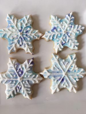 Watercolored snowflake cookies by the Artful Baker