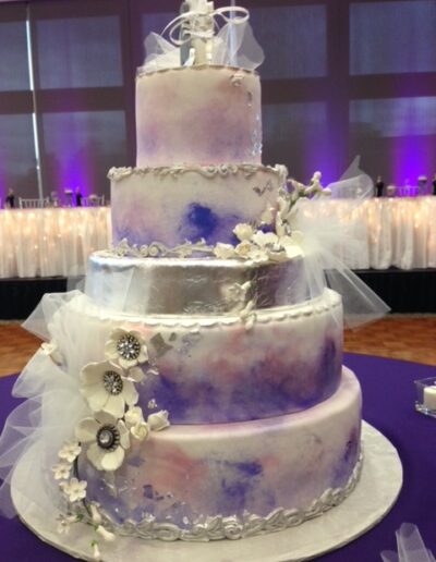 Stunning purple and silver wedding cake - The Artful Baker